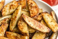 Crispy Oven-Roasted Potato Wedges with Garlic and Herbs