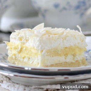 Coconut Cream Layered Dream is made from wholesome ingredients and is 6 net carbs | low carb, gluten-free, keto, thm-s | lowcarbmaven.com