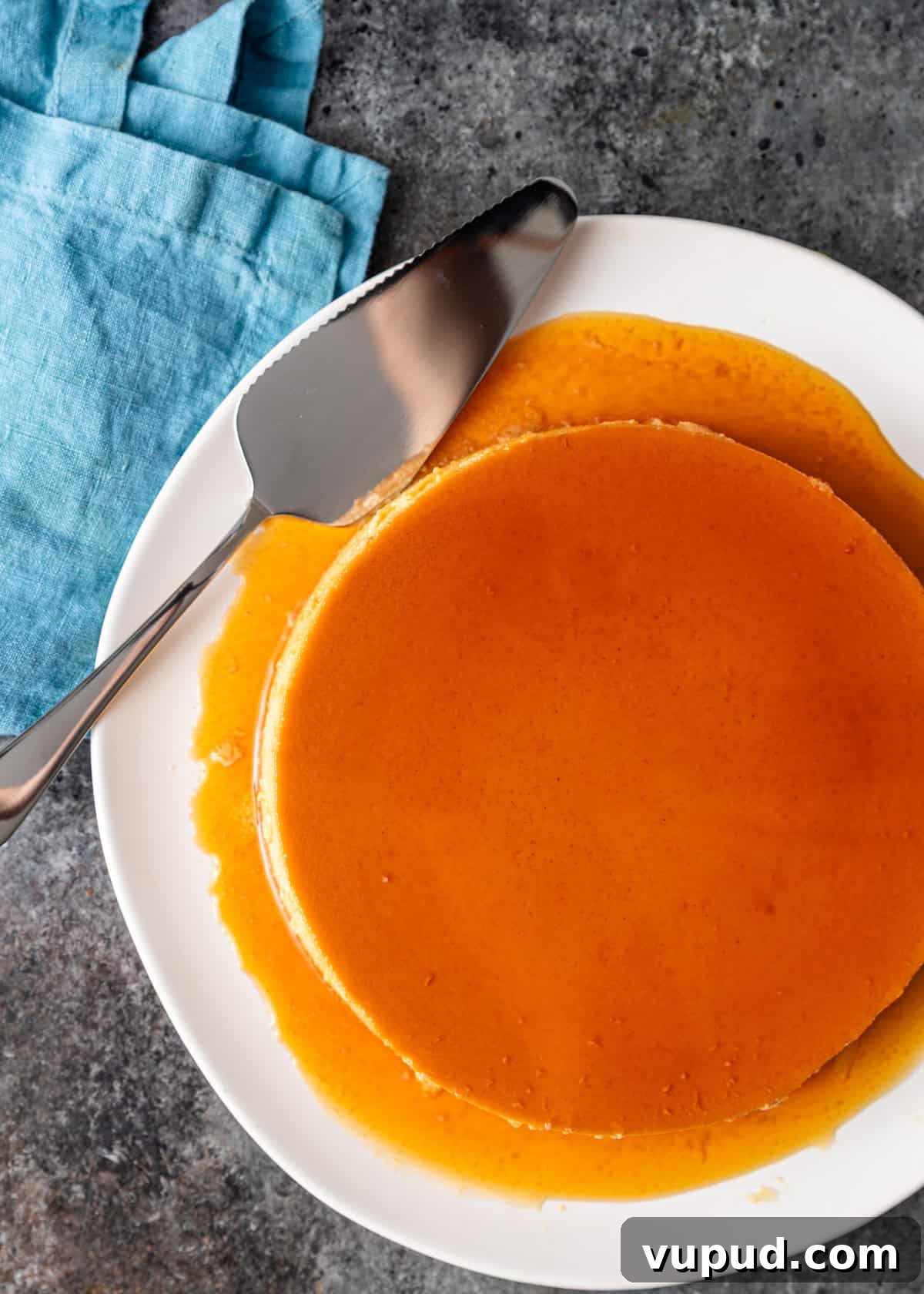 overhead: flan on a plate before slicing