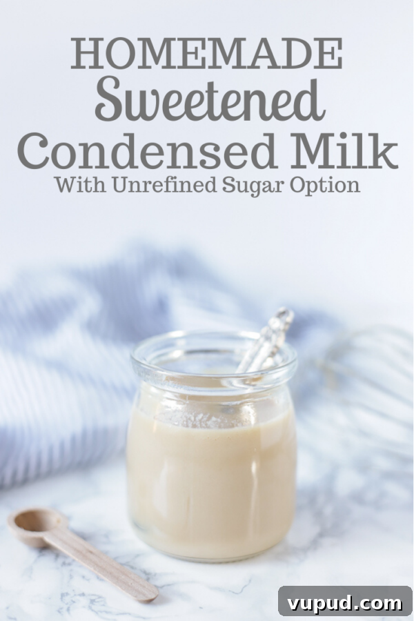Homemade Sweetened Condensed Milk: Simple Stovetop Recipe 2 Homemade sweetened condensed milk in a glass jar with an antique spoon