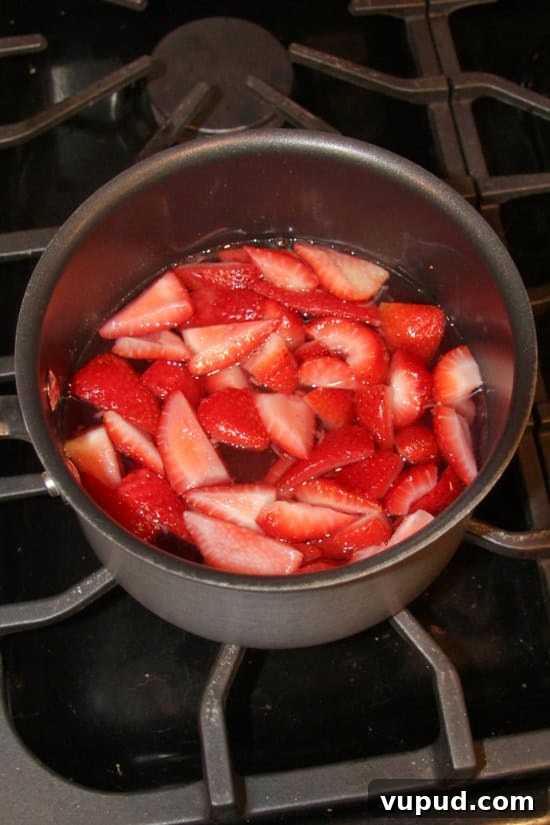 Strawberry Simple Syrup is super easy to make needing only 3 ingredients. Strawberry Simple Syrup