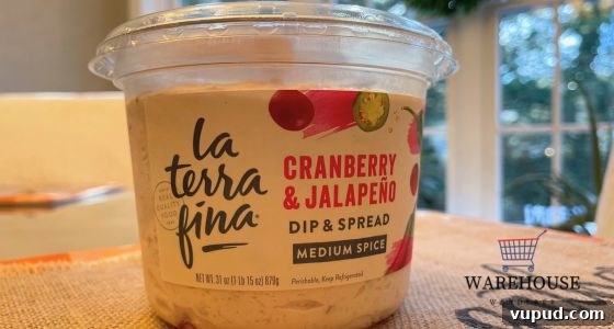 Top Costco Thanksgiving Appetizers for 2025 Holiday Hosting 4 La Terra Fina Cranberry and Jalapeño Dip from Costco with crackers and veggies — creamy Costco Thanksgiving dip.