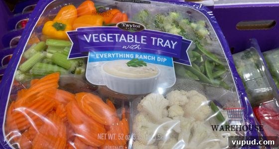 Top Costco Thanksgiving Appetizers for 2025 Holiday Hosting 10 Taylor Farms Vegetable Tray from Costco with fresh broccoli, peppers, and dip — healthy Costco Thanksgiving appetizer.