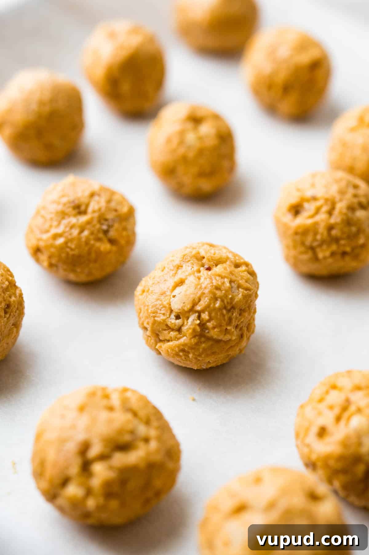 No-Bake Peanut Butter Rice Krispie Balls Dipped in Dark Chocolate 8 rolling the peanut butter rice krispie mixture into balls.