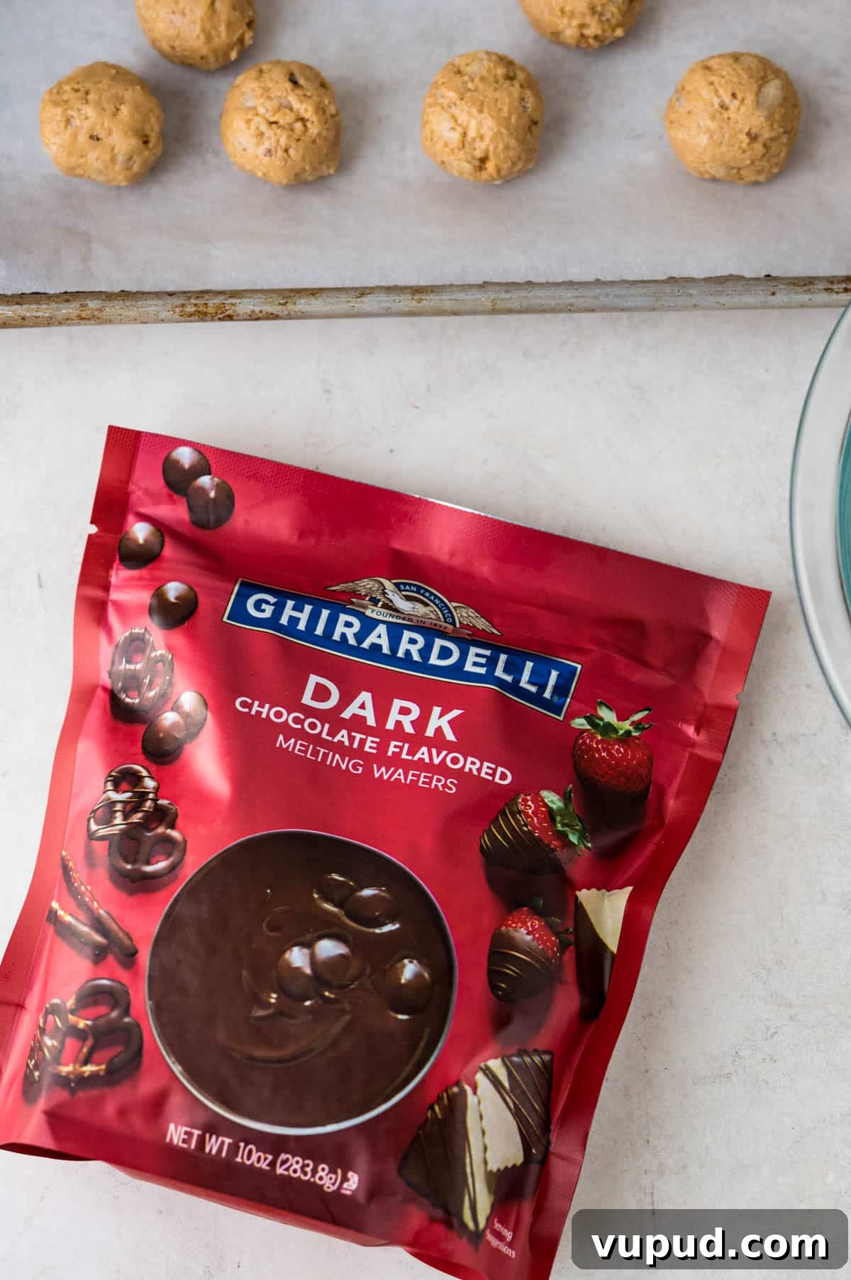 No-Bake Peanut Butter Rice Krispie Balls Dipped in Dark Chocolate 9 Ghirardelli dark chocolate melting wafers for coating the peanut butter candies.
