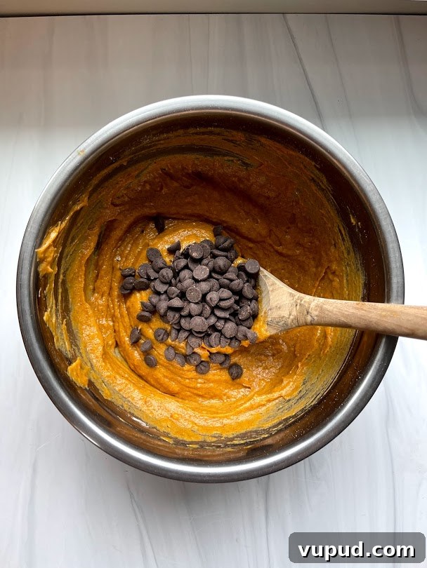 Gluten-Free Pumpkin Chocolate Chip Quick Bread Recipe 8 adding chocolate chips to pumpkin bread batter