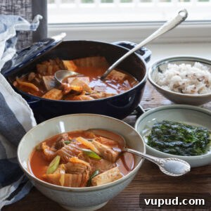 Tomato Kimchi Stew Recipe: Savory Korean Tomato-Kimchi Jjigae 11 Kimchi Stew (Kimchi Jjigae) with Tomatoes is served with rice and roasted seaweed.