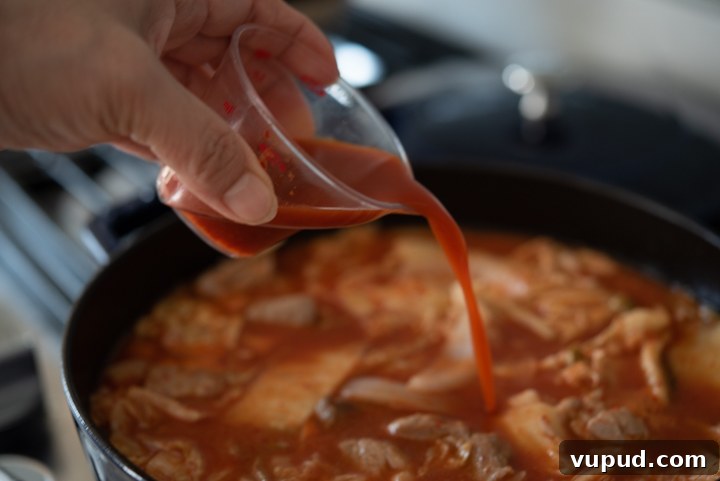 Tomato Kimchi Stew Recipe: Savory Korean Tomato-Kimchi Jjigae 8 Kimchi juice added.