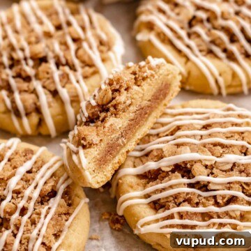 Coffee cake cookies. One is cut in half to show the center.