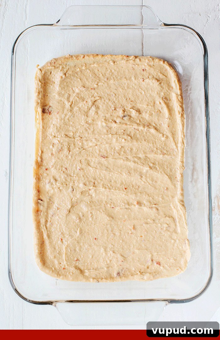 Spicy 7-Layer Taco Dip Recipe — Flavorful Fiesta Appetizer 4 Healthier 7 Layer Spicy Taco Dip made with Greek yogurt, hummus, fresh guacamole, chunky salsa and toppings