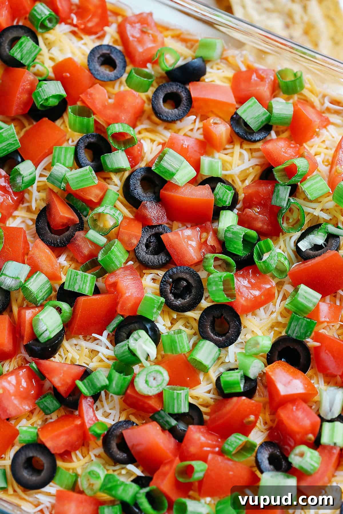 Spicy 7-Layer Taco Dip Recipe — Flavorful Fiesta Appetizer 5 Healthy 7 Layer Spicy Taco Dip with toppings