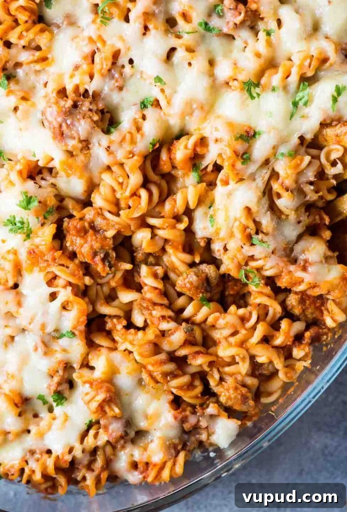 Cheesy Baked Chicken Tortellini Casserole Recipe 10 Tangy tomato sauce, spicy Italian Sausage and lots of cheese together makes this baked pasta dish delicious and super satisfying.