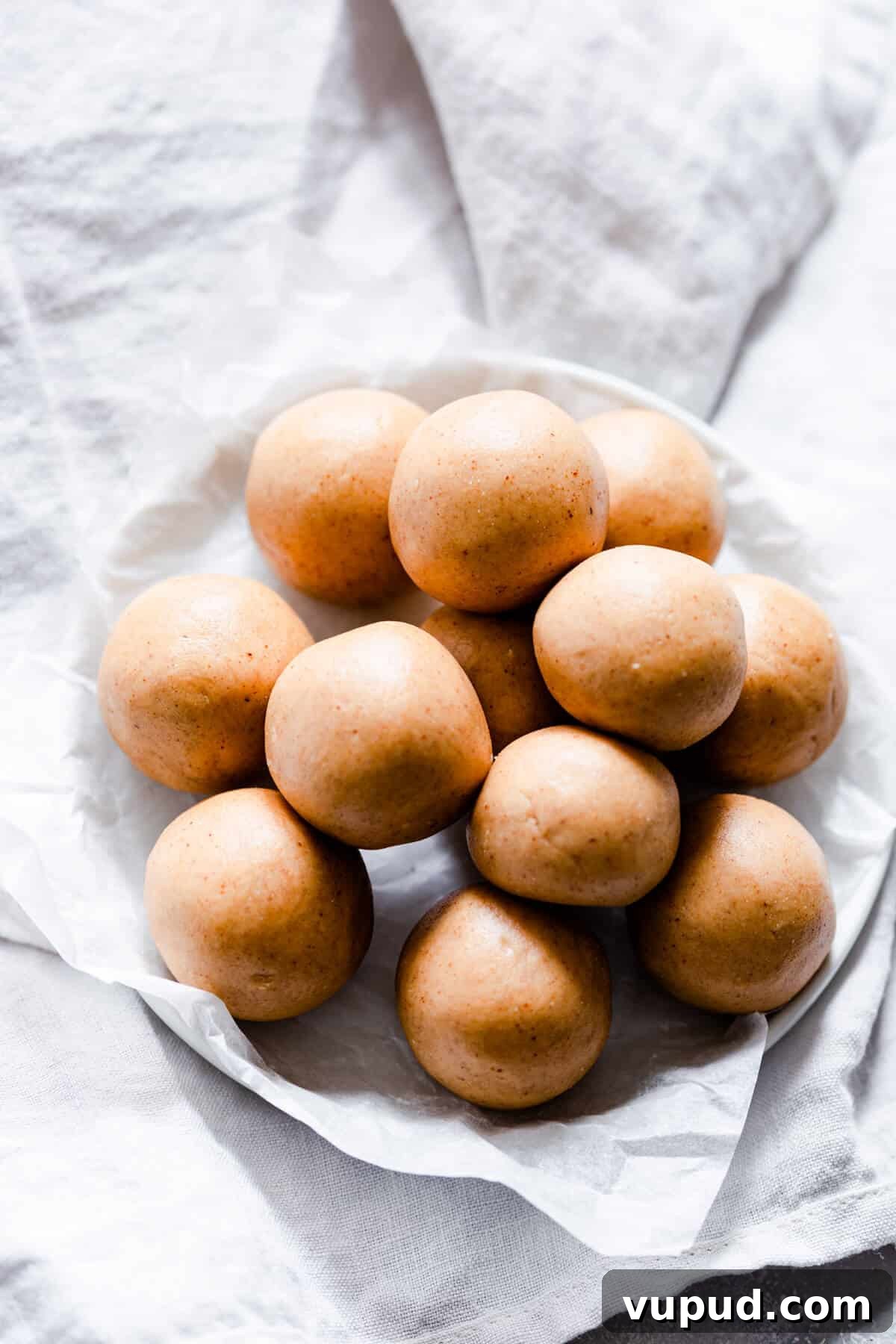 Peanut Butter Energy Balls: 3-Ingredient No-Bake Snack 8 top view of energy balls on a small plate