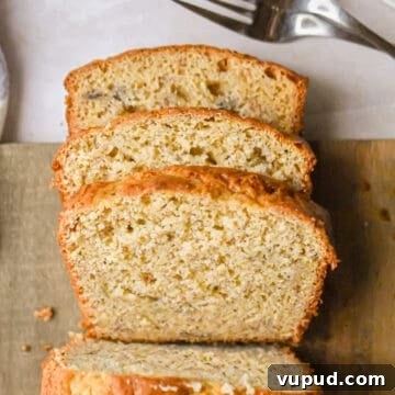 4-Ingredient Banana Bread from Cake Mix — Quick Recipe 16 An overhead shot of three slices of banana bread.