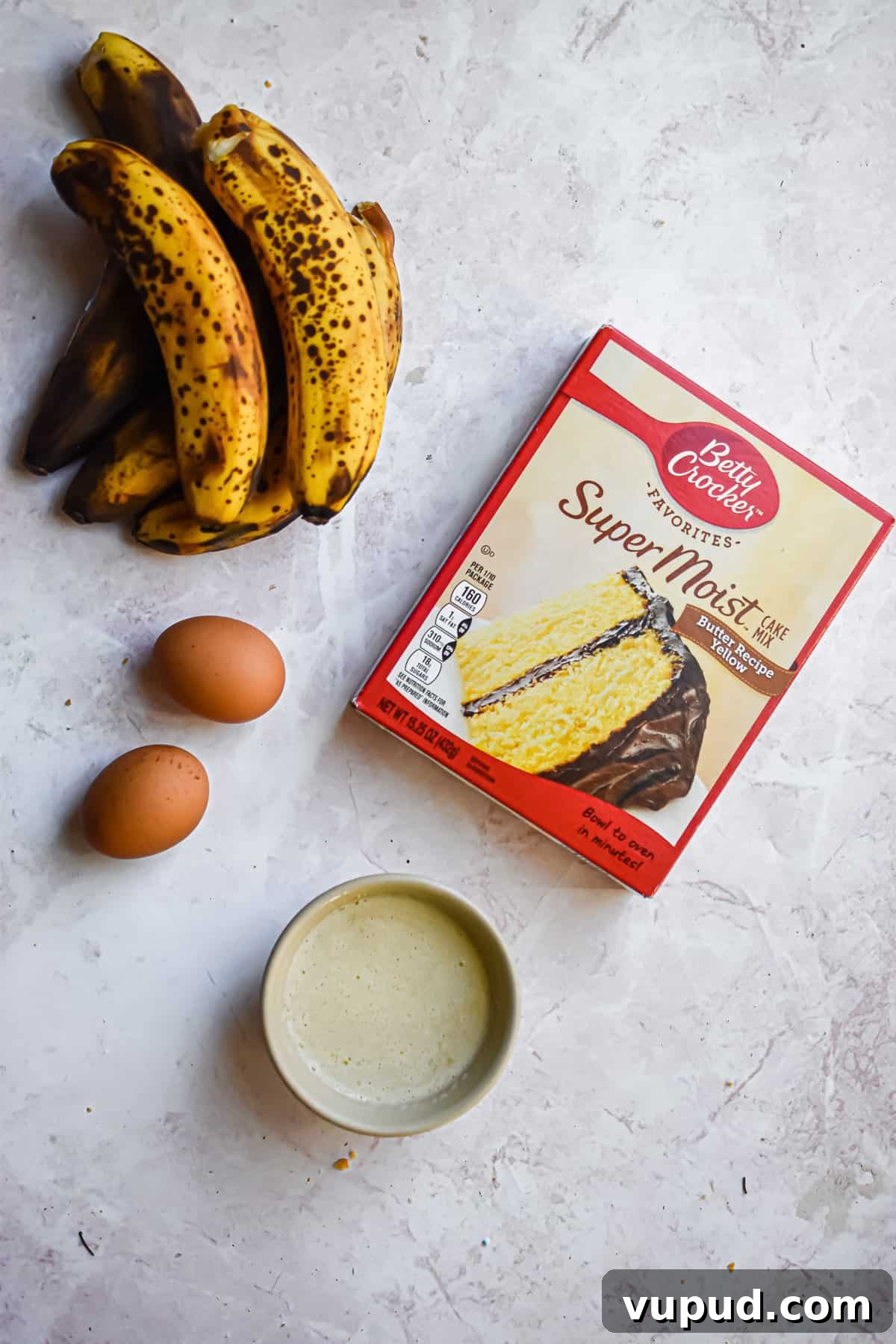 4-Ingredient Banana Bread from Cake Mix — Quick Recipe 3 An overhead shot of the ingredients for cake mix banana bread
