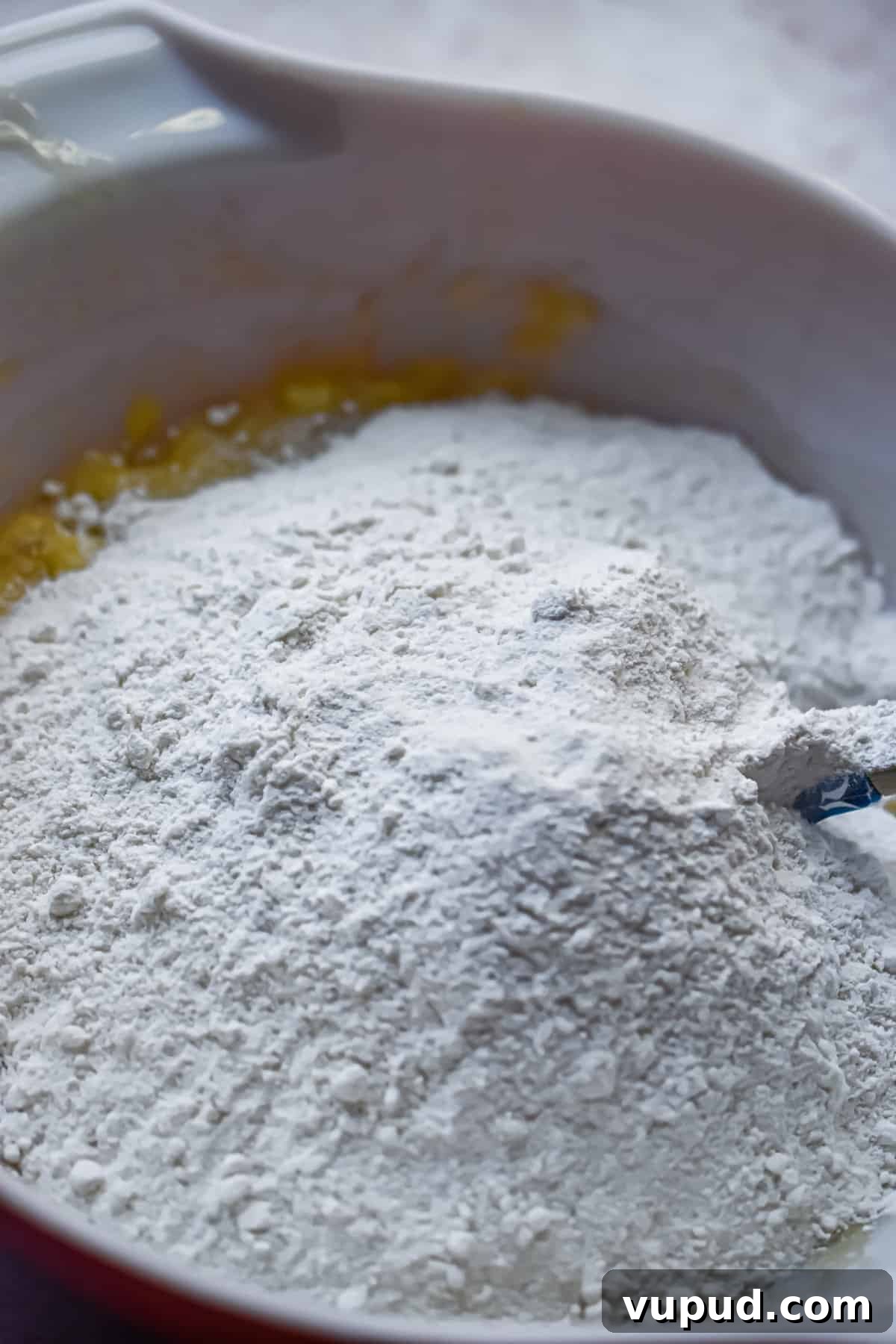 4-Ingredient Banana Bread from Cake Mix — Quick Recipe 6 The cake mix is added to the bowl.
