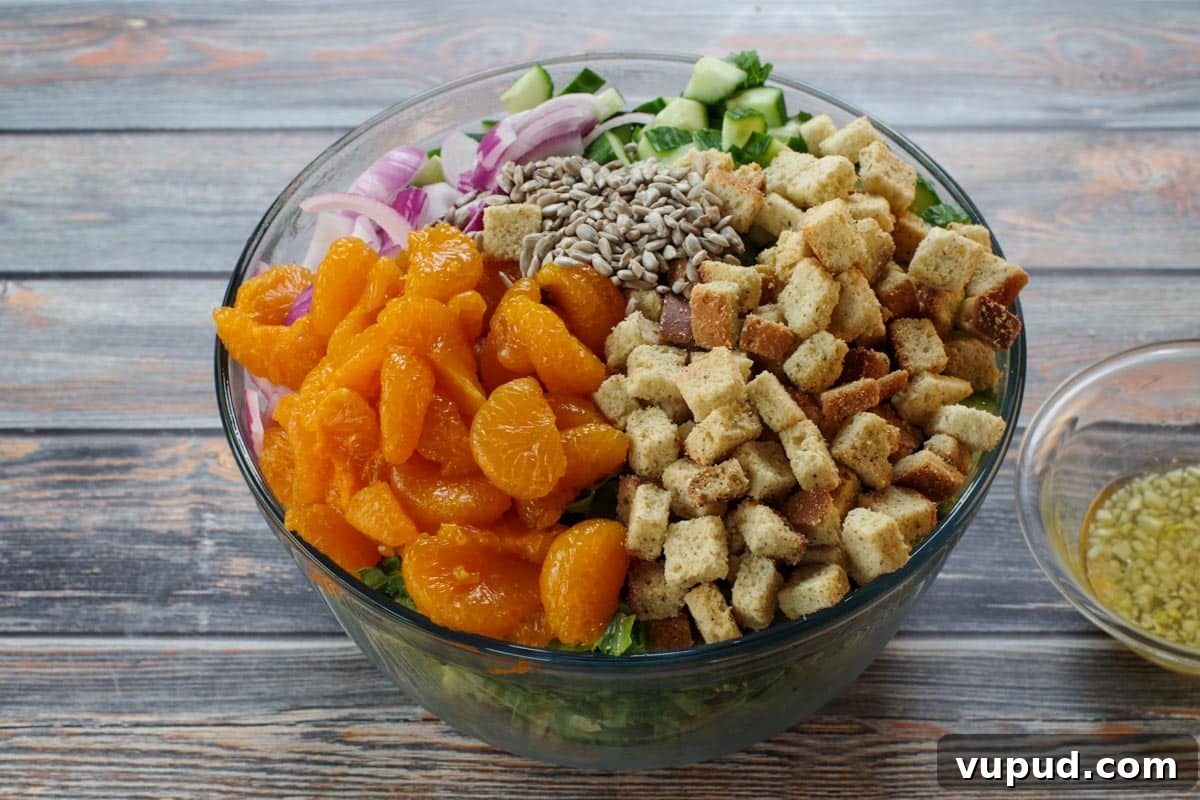 Zesty Mandarin Orange Salad Recipe with Citrus Vinaigrette 5 Mandarin orange salad ingredients in large bowl