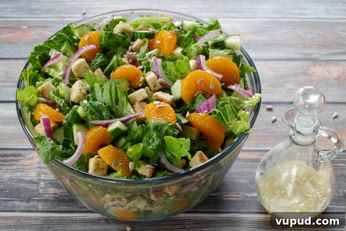Zesty Mandarin Orange Salad Recipe with Citrus Vinaigrette 6 mandarin salad mixed together in a large bowl