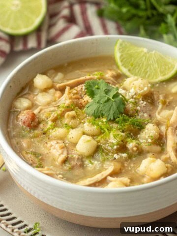 Bowl of green posole in bowl.