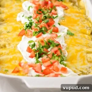 Pan of cream cheese chicken enchiladas.