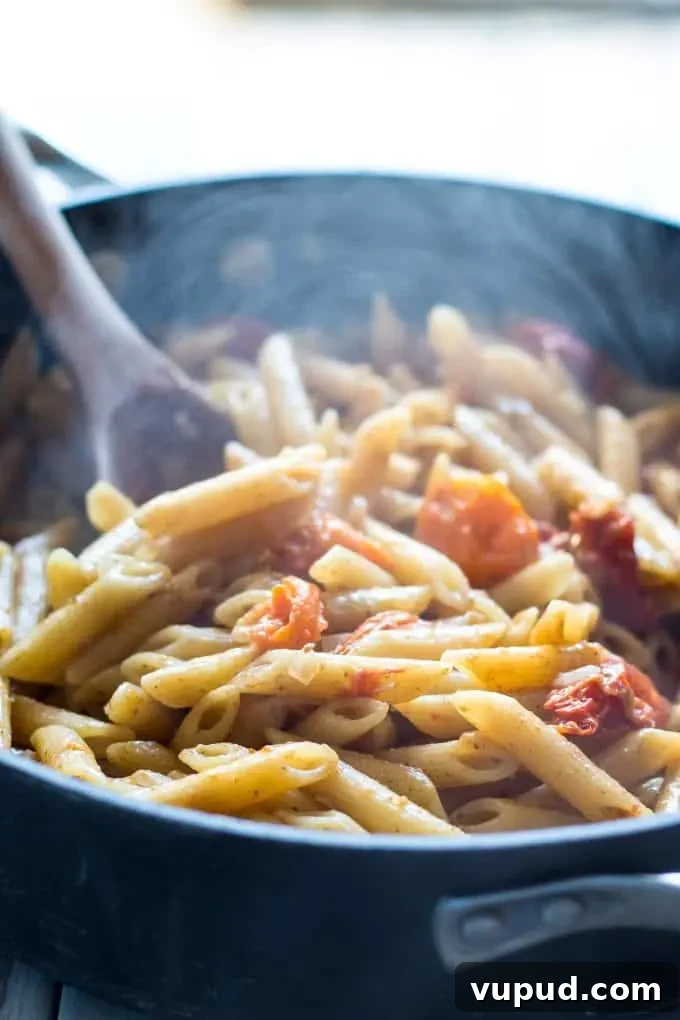 One-Pot Tomato Pesto Pasta Recipe for Quick Weeknight Meals 3 tomato pesto and pasta in a pan