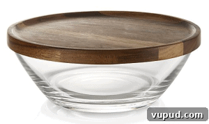 Top Kitchen Gifts for Home Cooks and Food Lovers 24 Front view of a glass bowl with a wooden lid
