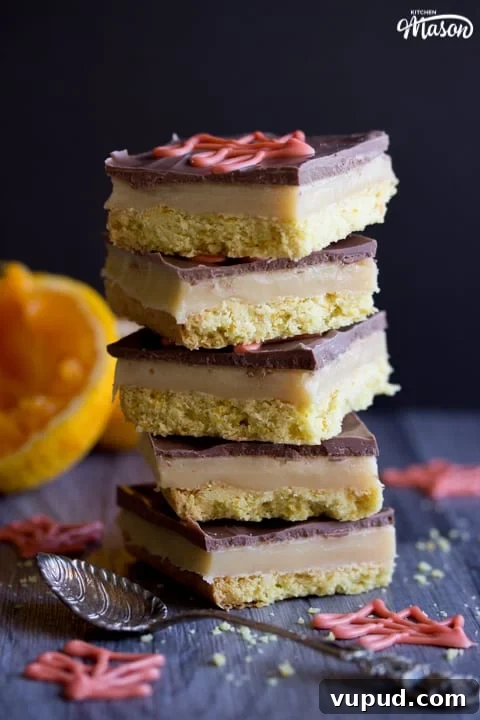 Chocolate Orange Caramel Shortbread Recipe — Zesty Caramel Slice 4 Chocolate Orange Caramel Shortbread in a stack