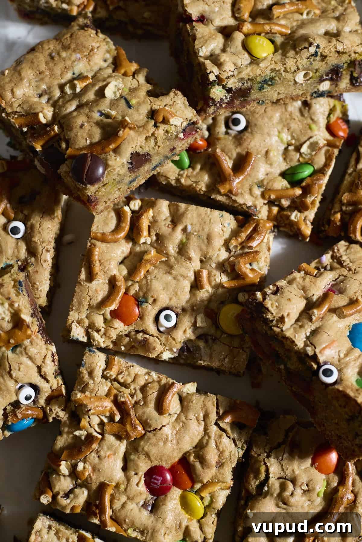 Halloween Sourdough Discard Kitchen Sink Cookie Bars 2 Sliced Sourdough Discard Halloween Kitchen Sink Cookie Bars in a pile.