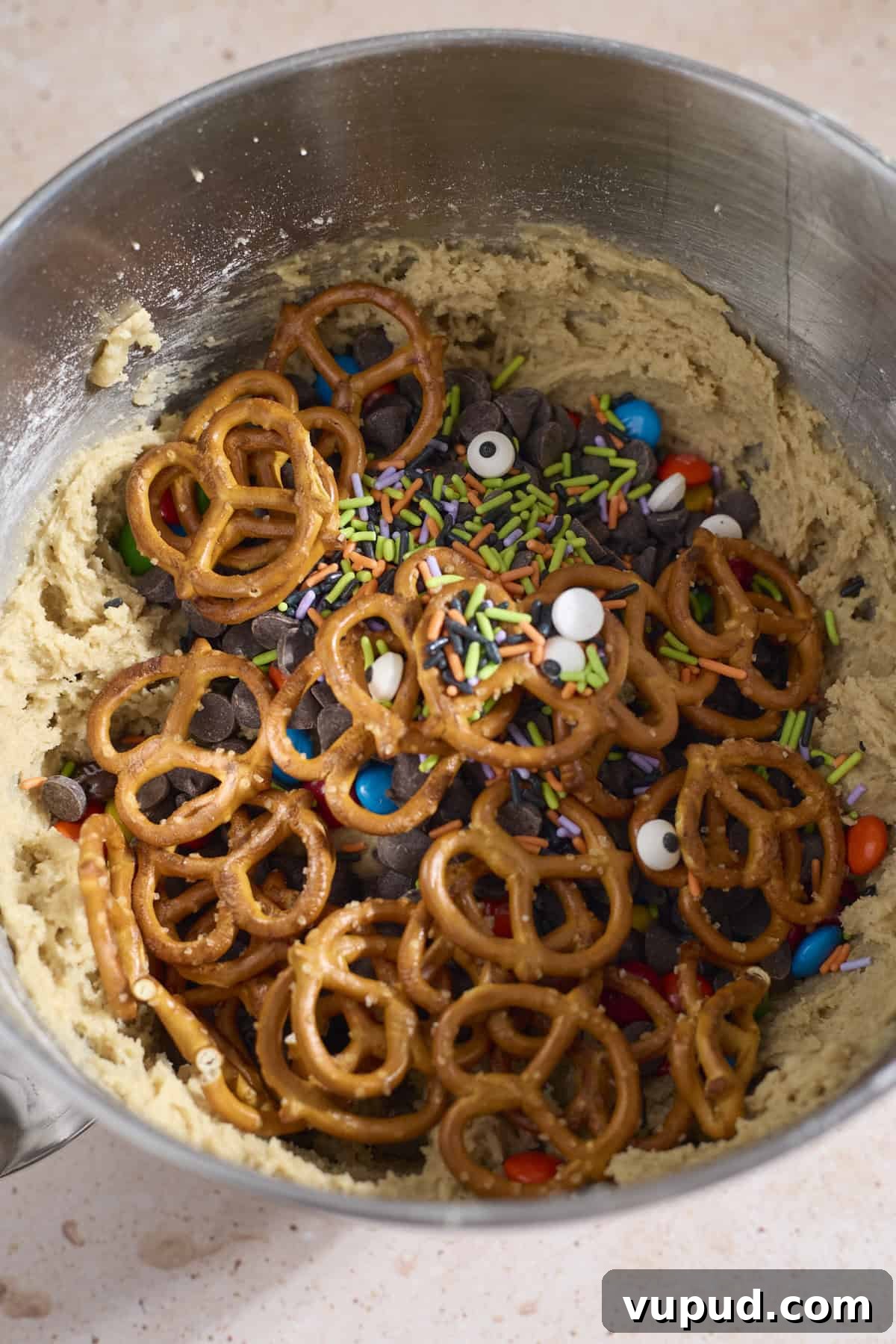 Halloween Sourdough Discard Kitchen Sink Cookie Bars 7 Mix-ins added to the bowl of cookie batter.