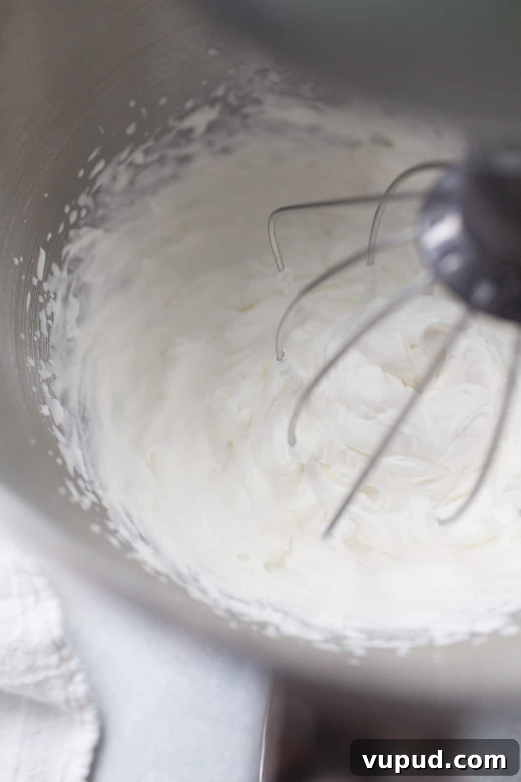 How to Make Perfect Homemade Whipped Cream at Home 4 top view of a stand mixer making whipped cream