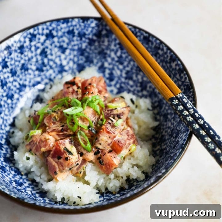 Spicy Ahi Poke over rice in bowl