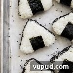 Spicy Tuna Onigiri Recipe — Authentic Japanese Rice Balls 9 Closeup shot of spicy tuna Onigiri (Japanese rice balls).