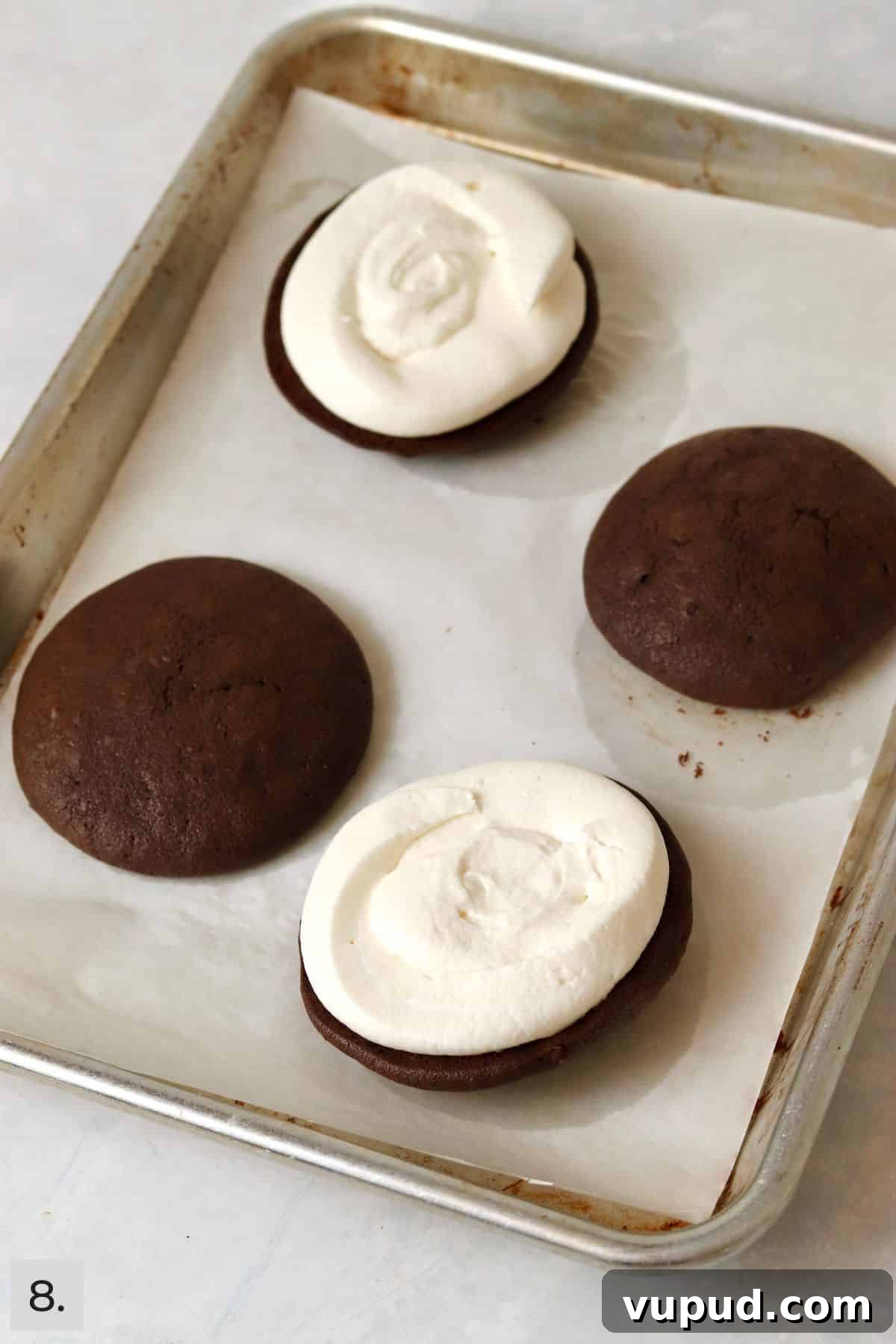 Mini Whoopie Pie Recipe for One — Small Batch Dessert 11 Single serve whoopie pies on baking sheet before being sandwiched.