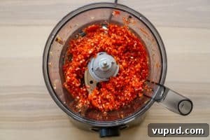 Georgian Adjika: Abkhazian & Megrelian Spicy Chilli Paste Recipe 8 Chopping the peppers, chilies and garlic