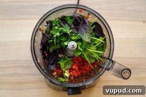 Georgian Adjika: Abkhazian & Megrelian Spicy Chilli Paste Recipe 9 Adding the herbs to the food processor