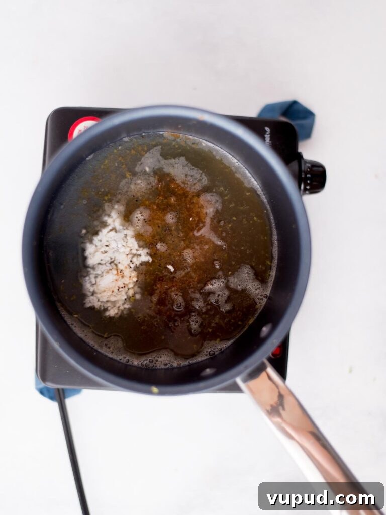 Tequila-Lime Chicken Wings: Zesty Grilled Wing Recipe 7 Tequila lime sauce ingredients measured and added to a saucepan.