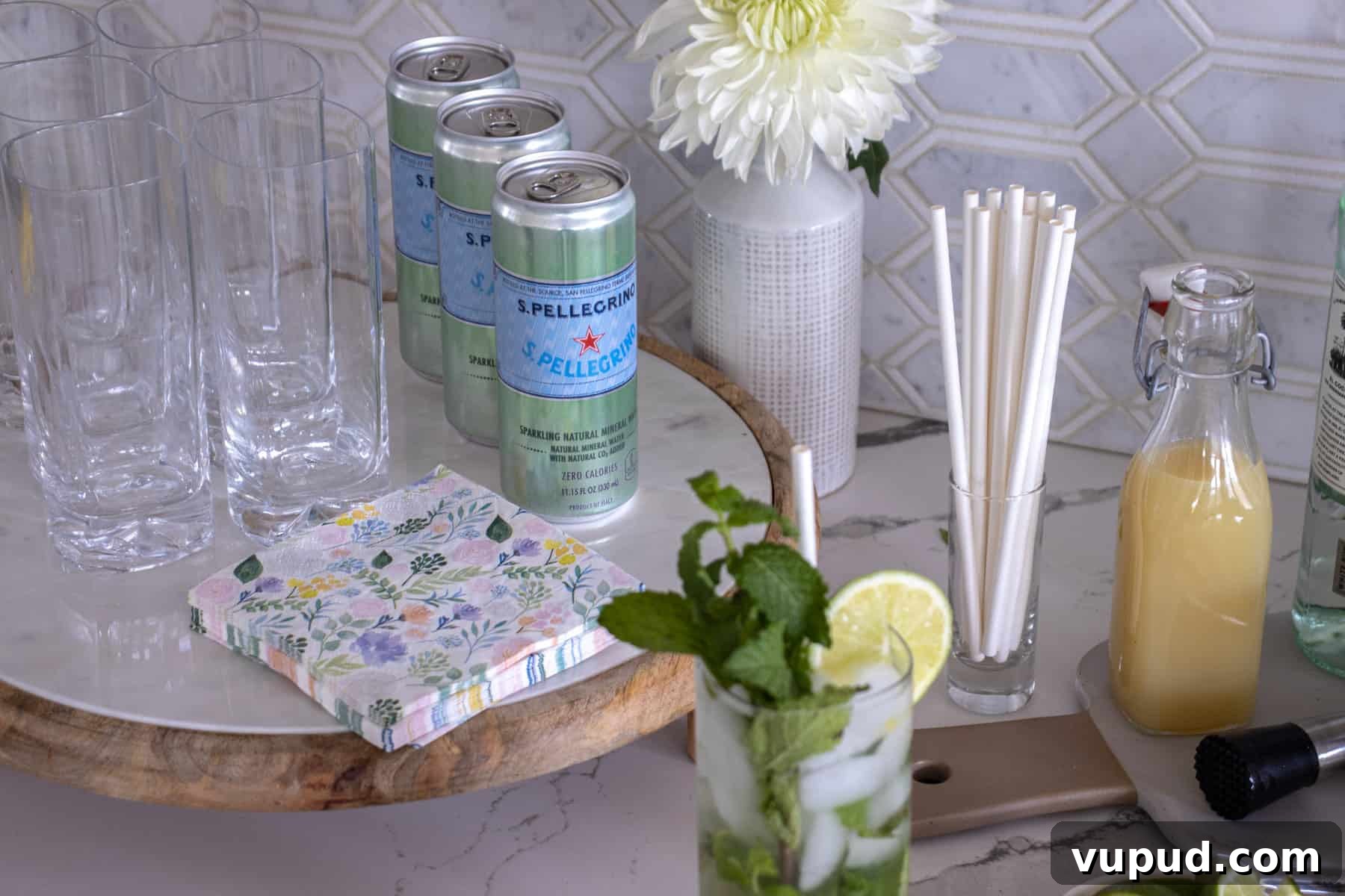 Mint Mojito Bar Ideas for Parties: DIY Setup & Refreshing Recipes 8 Mojito bar set up with club soda and glasses.