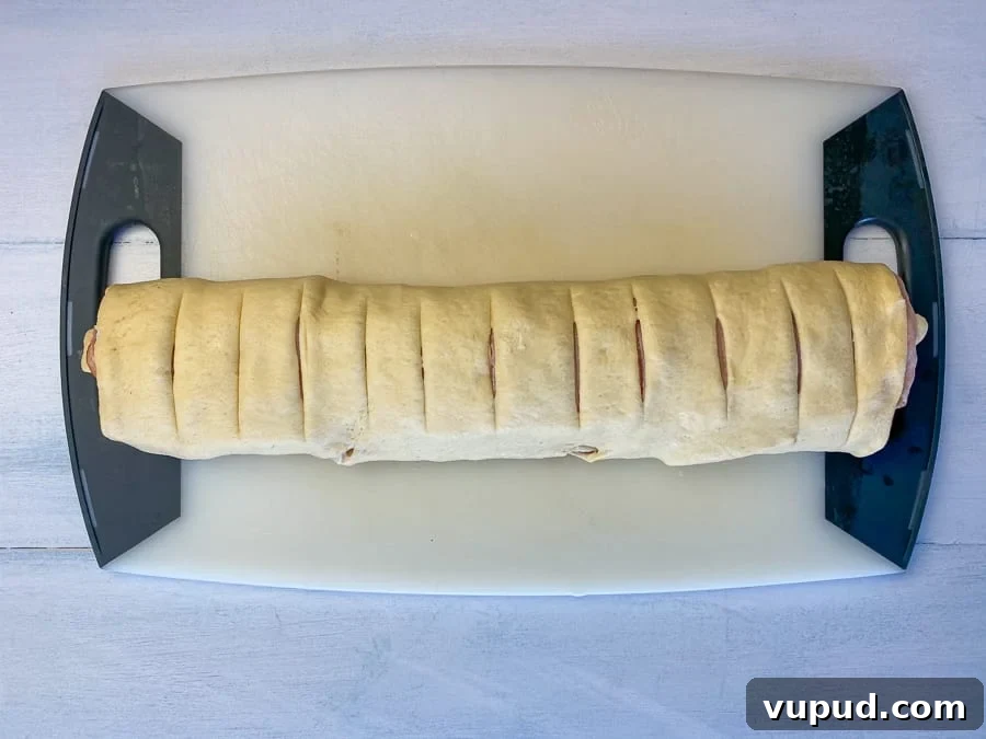 Quick Ham and Cheese Roll-Ups: 4-Ingredient Party Snack 11 Slice ham roll-up into 12 equal sized pieces