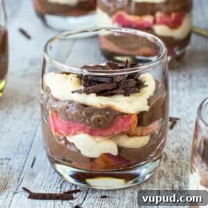 Classic Zuppa Inglese Recipe: Layered Italian Custard Dessert 7 Zuppa Inglese in a glass with a gold spoon standing upright in the dessert.