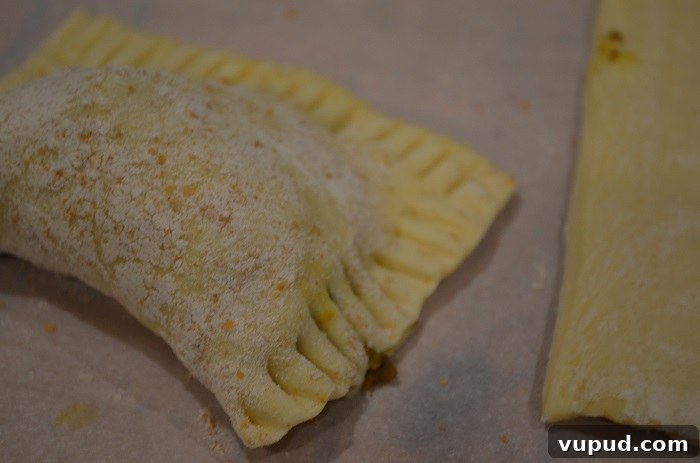 Crispy Beef Samosa Puff Pastries: Flaky Indian-Inspired Bites 20 fold over