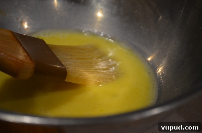 Crispy Beef Samosa Puff Pastries: Flaky Indian-Inspired Bites 21 add milk and brush