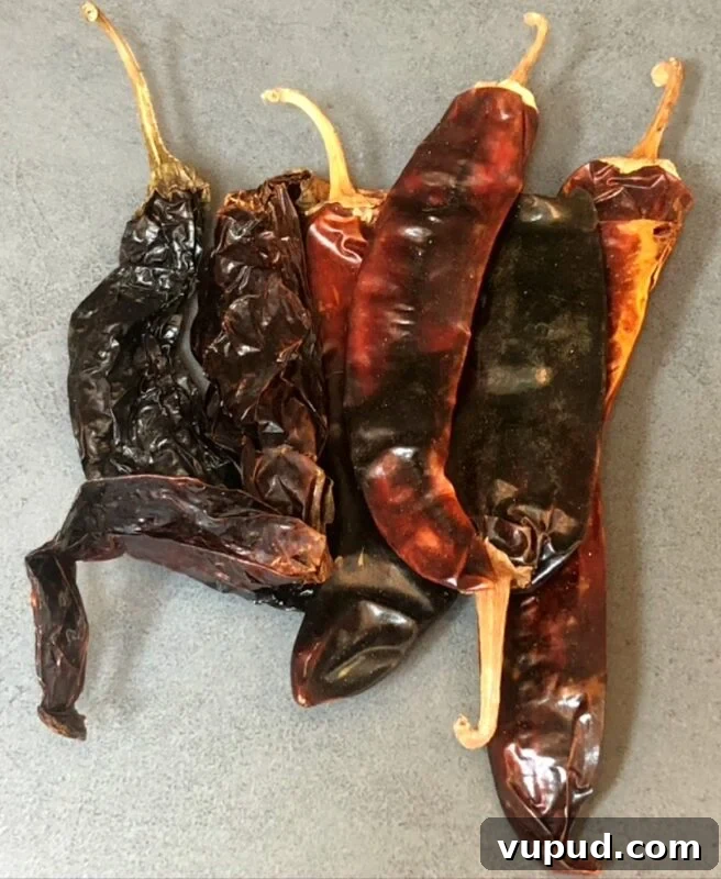 Authentic Mexican-Style Beans in the Instant Pot: Flavorful & Fast 8 dried Mexican chiles on a counter