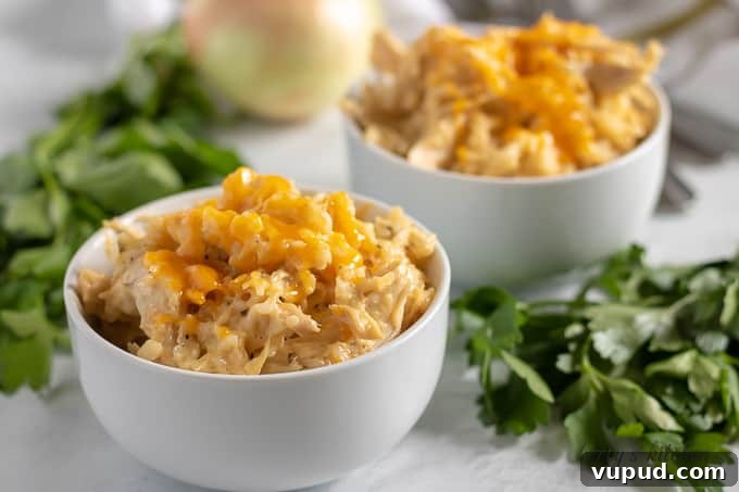 Instant Pot Ranch Chicken & Rice Casserole Recipe 2 Ranch chicken and rice topped with cheese.