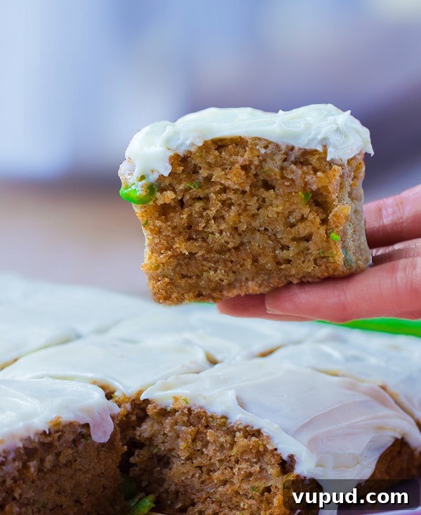 Zucchini cake served with frosting Zucchini cake served with frosting