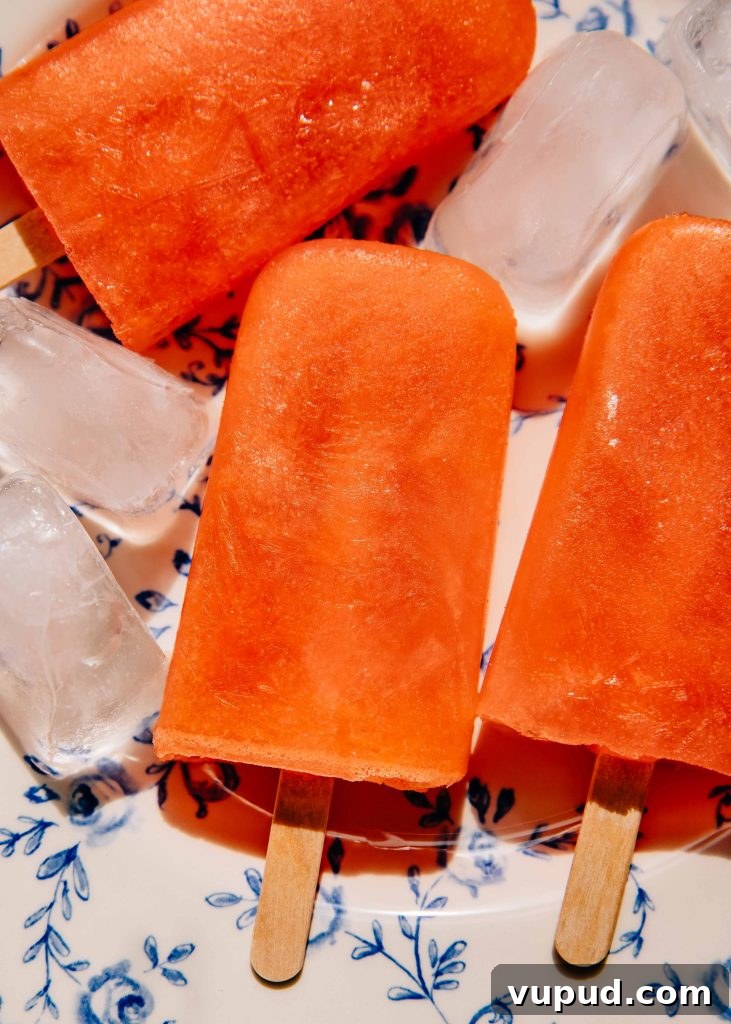 Aperol Spritz Popsicles Recipe: Refreshing Summer Cocktail Ice Pops 6 Aperol Spritz Popsicles | Well and Full | #summer #vegan #recipe #cocktails #vegetarian