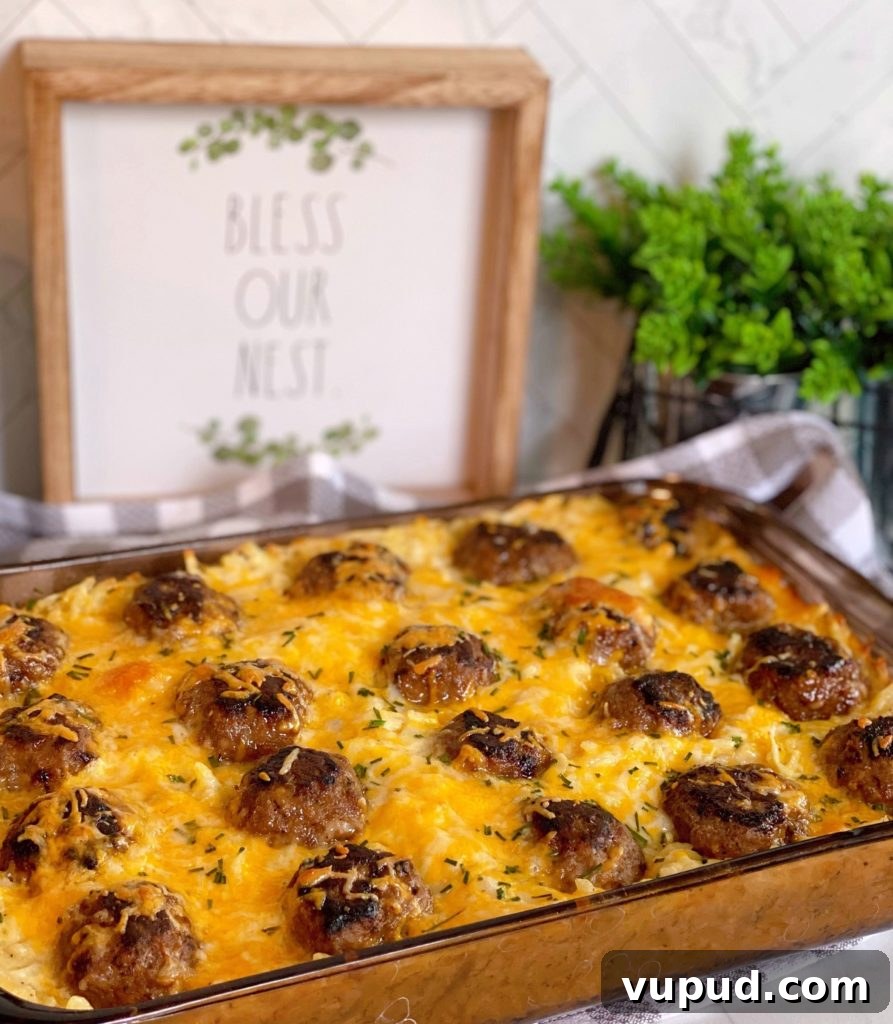 Cheesy Meatball and Hash Brown Casserole Recipe 2 Casserole dish filled with Meatball and Hash Brown Casserole.