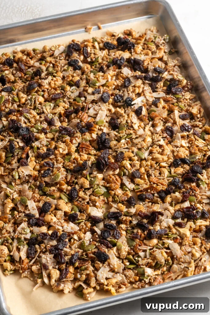 Grain-Free Homemade Granola Recipe for Crunchy, Low-Carb Mornings 12 grain free granola on the baking sheet after mixing in the dried fruit and continuing to bake until golden and crisp.