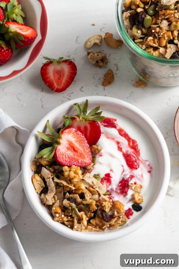 Grain-Free Homemade Granola Recipe for Crunchy, Low-Carb Mornings 17 grain free granola yogurt bowl with strawberries.
