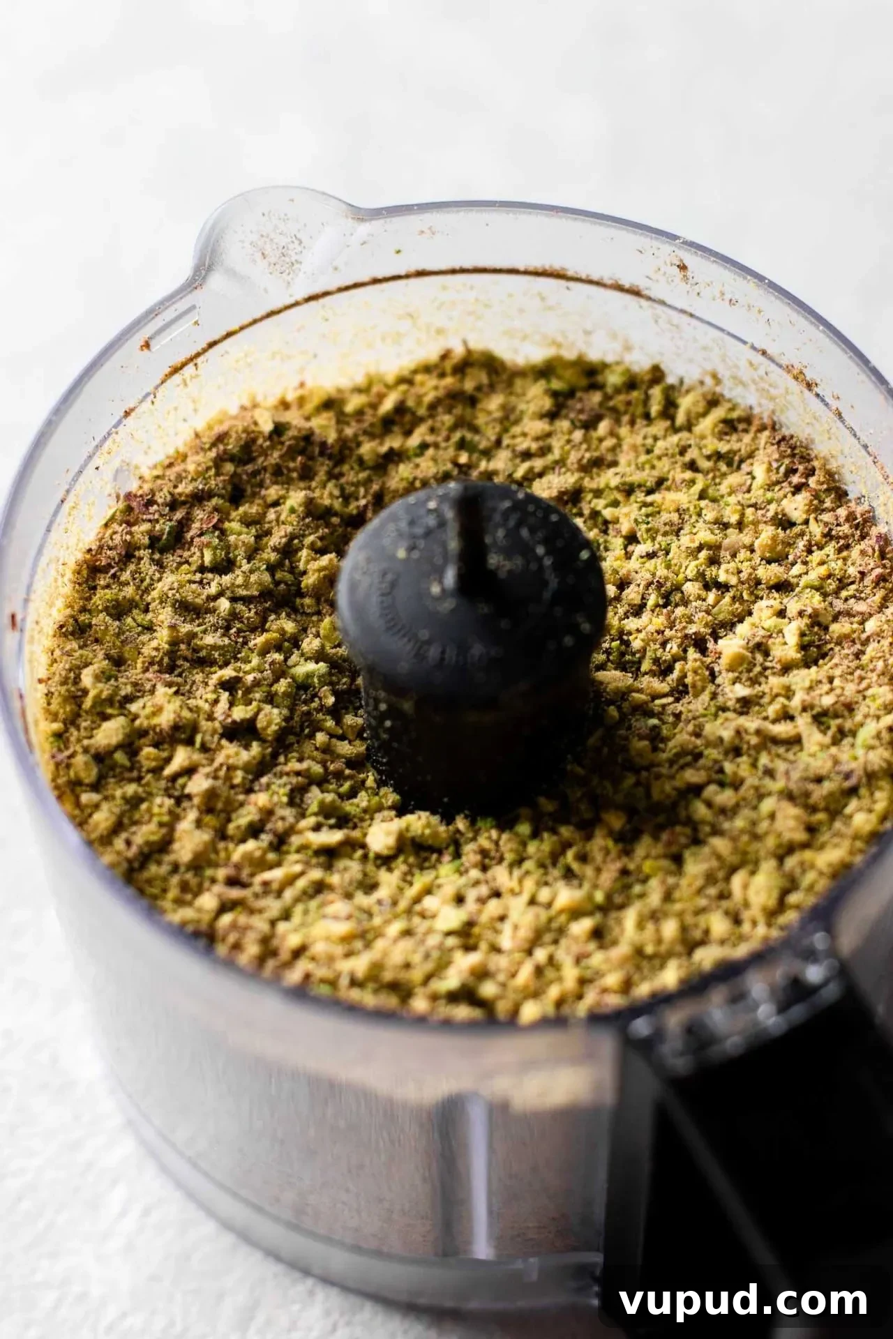 Silky Pistachio Layer Cake with Toasted Nut Crumble 4 ground pistachios in food processor