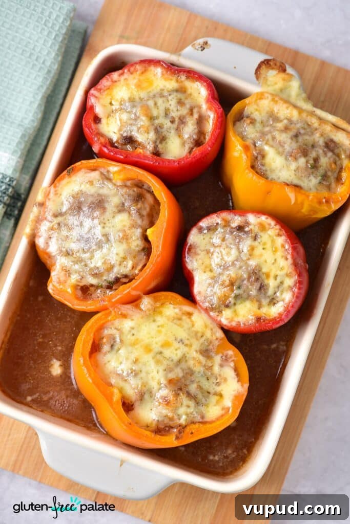 Gluten-Free Stuffed Peppers Recipe: Flavorful Vegetarian Dinner 8 Gluten-Free Stuffed Peppers in a white casserole dish